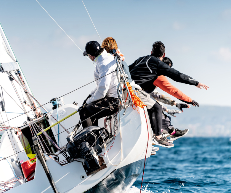 Sailing boat in light wind during regatta competition